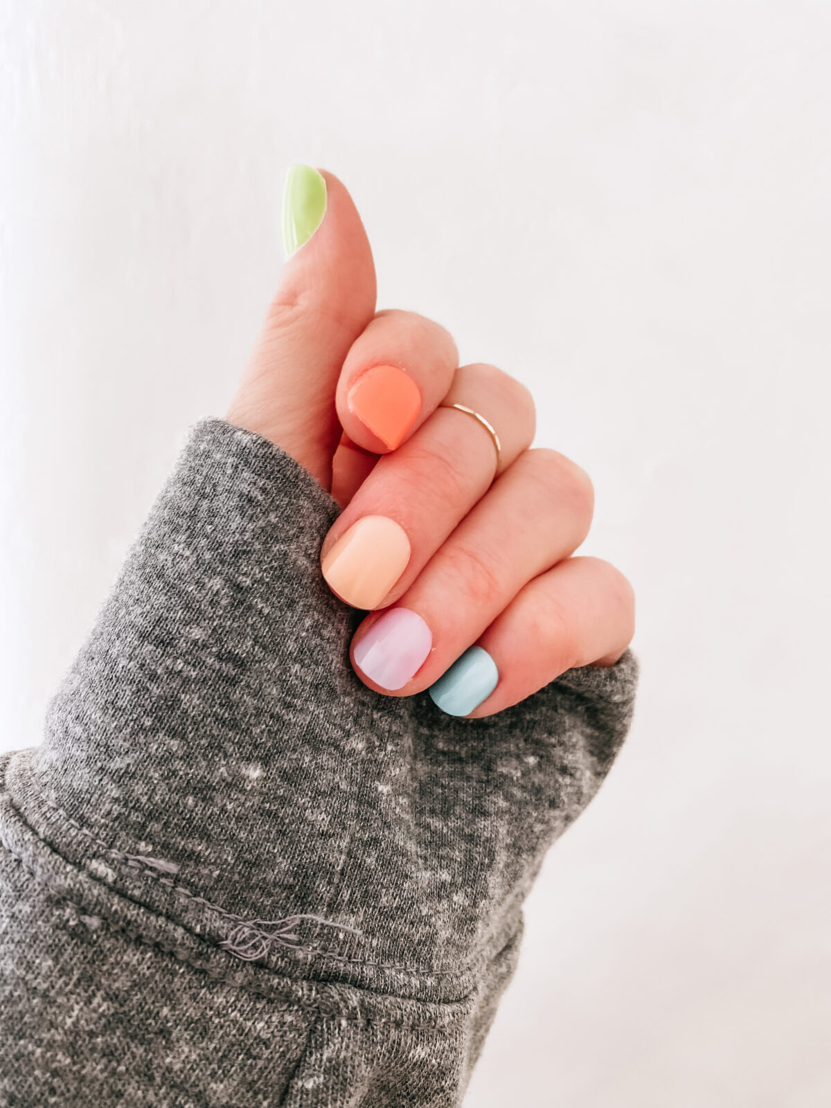 a spring manicure in pastel colors

