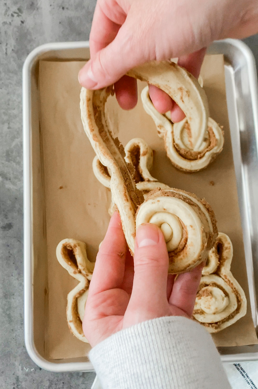 unroll cinnamon roll dough to shape into a bunny for a cute Easter treat